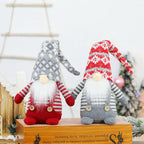 Christmas elf figure with knitted hat, sitting