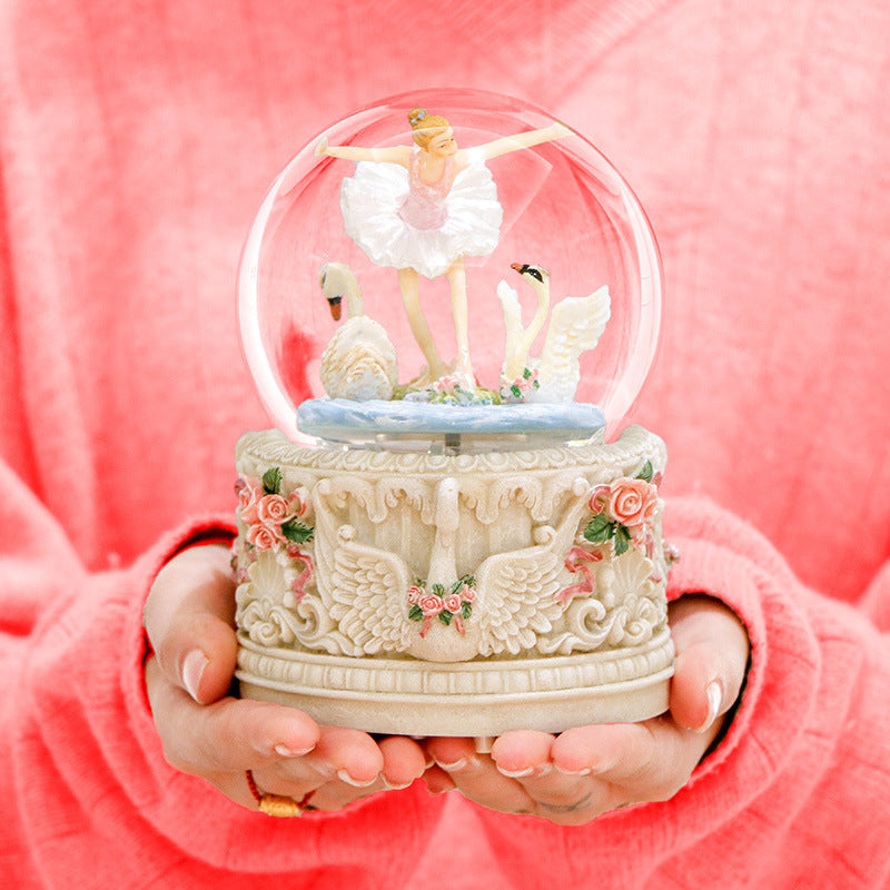Music box with dancing ballerina and carousel