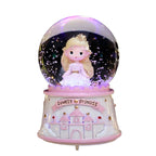 Christmas music box with snow globe and light