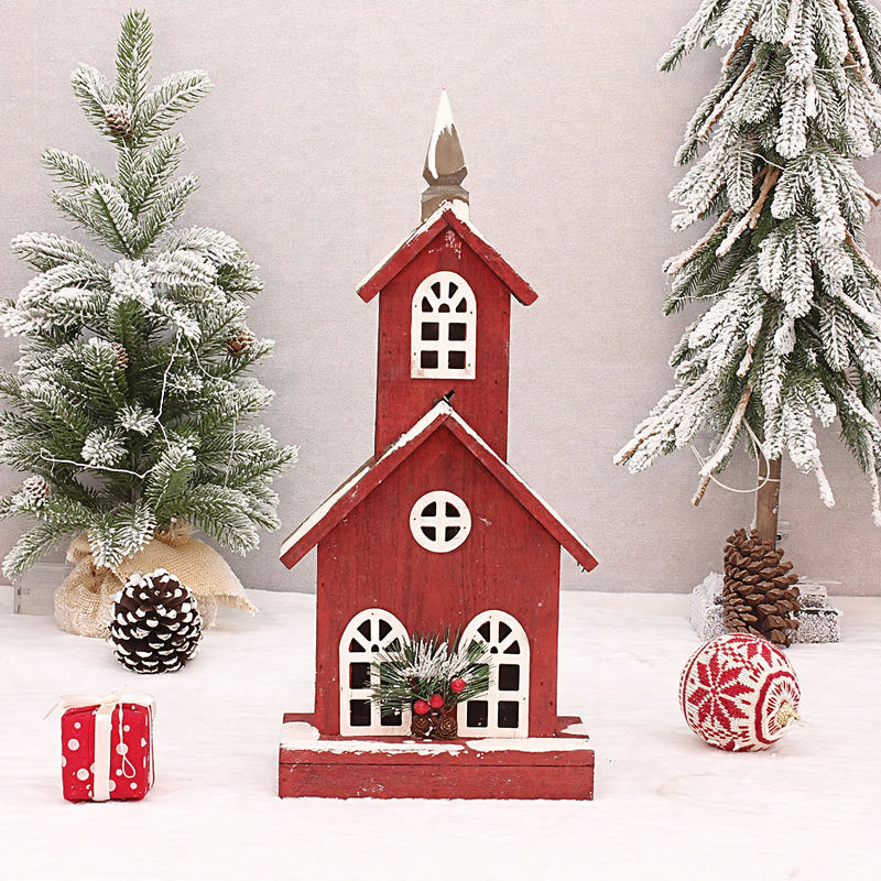 Illuminated red wooden house, Christmas decoration