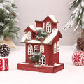 Illuminated red wooden house, Christmas decoration