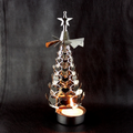 Rotating candle holder made of copper
