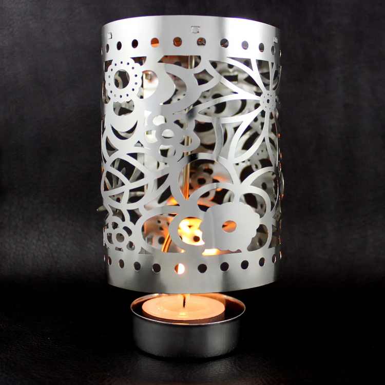 Rotating tealight holder made of brass, Christmas design