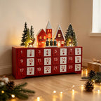 Illuminated wooden Advent calendar in village design