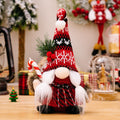 Christmas elf figure with knitted hat, standing