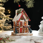 Illuminated wooden Christmas house in European retro style