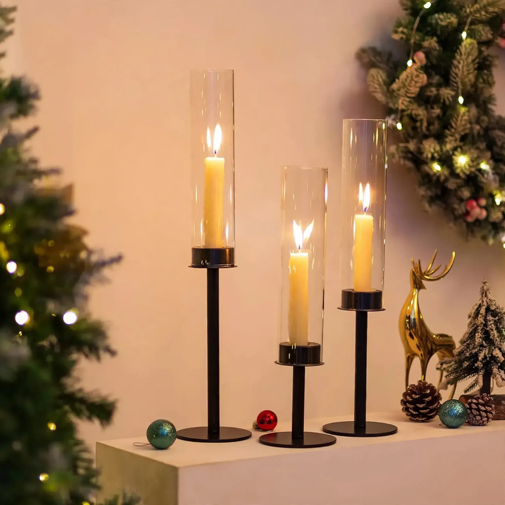 Decorative candle holder made of glass and metal