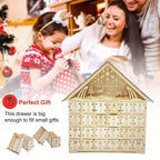 Illuminated wooden Advent calendar in cabin design