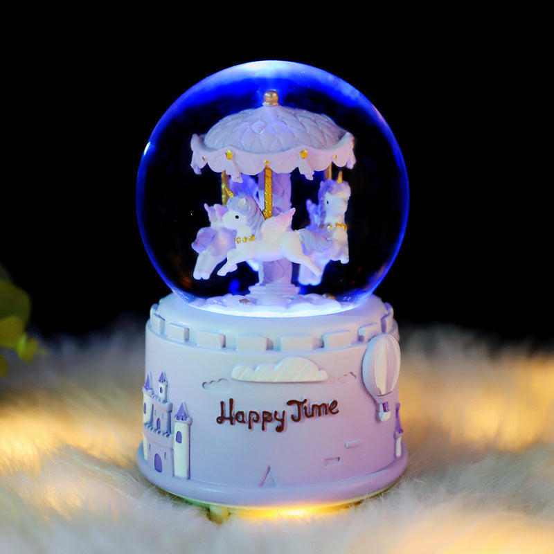 Decorative music box with carousel and snow effect