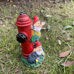Gnome figure with red hat and hydrant motif