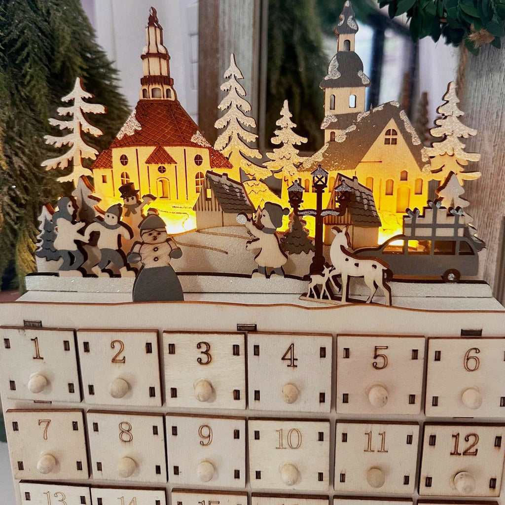 Christmas Advent calendar made of wood with 24 drawers