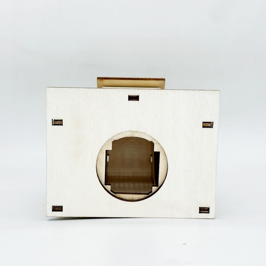Illuminated wooden house for Christmas decoration