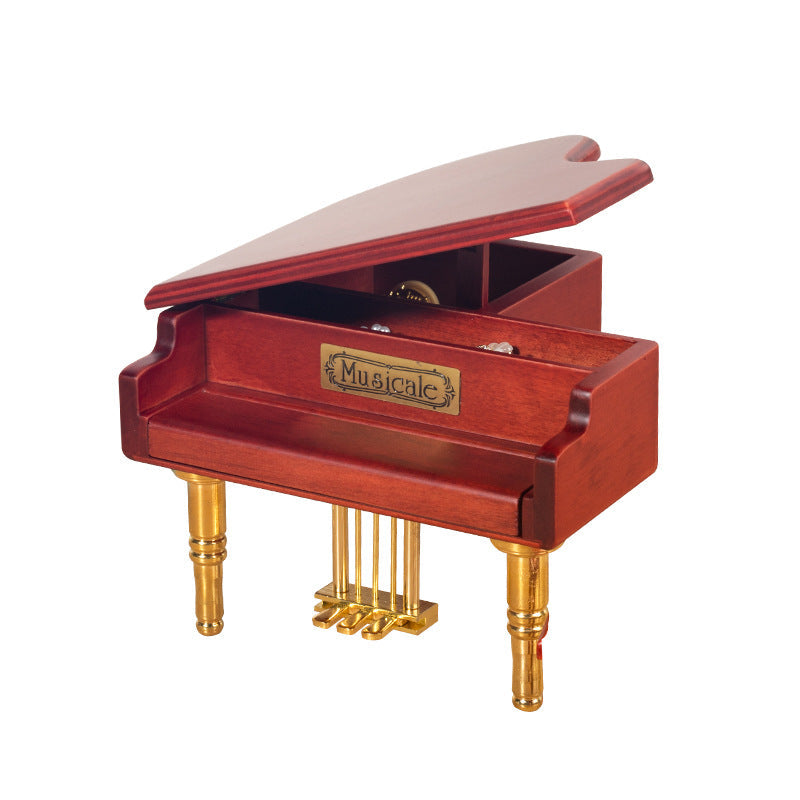 Wooden music box in piano shape with metal feet