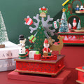 Christmas music box made of wood with carousel motif