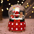 Illuminated snow globe music box, resin