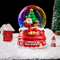 Christmas snow globe with music box and carriage design