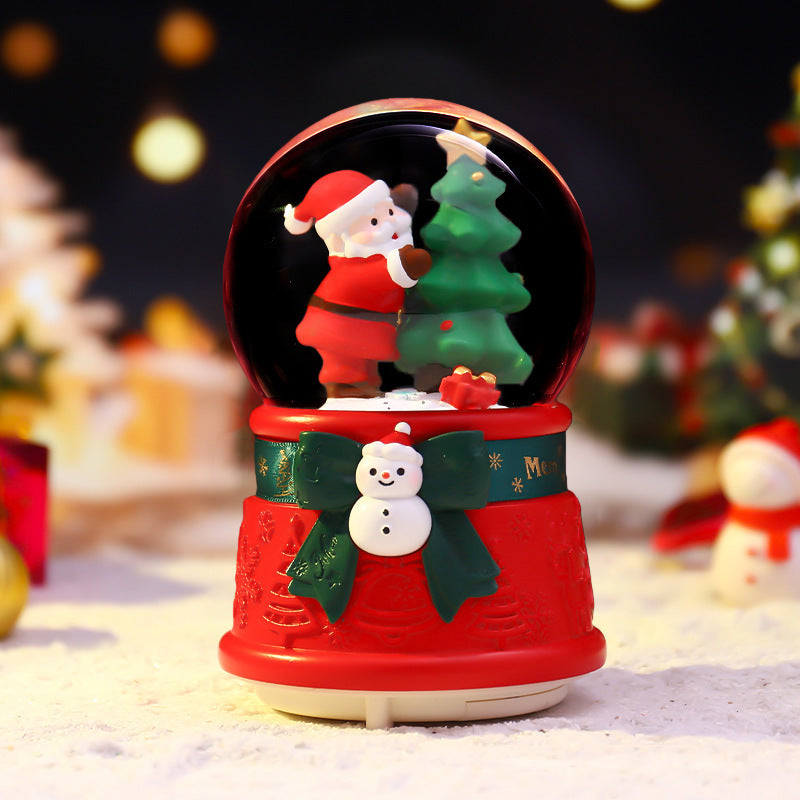 Illuminated snow globe with music and snow effect