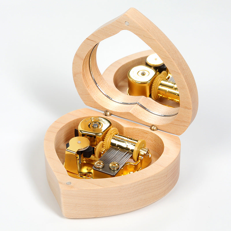 Wooden music box in heart shape with mirror
