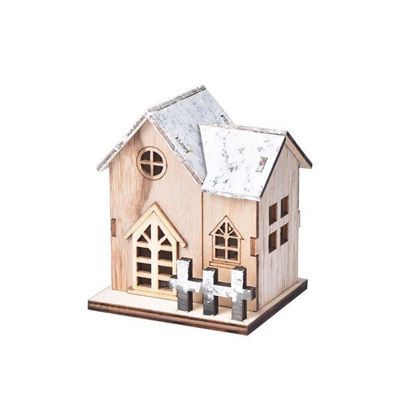 Illuminated wooden house for Christmas decoration