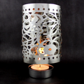 Rotating tealight holder made of brass, Christmas design