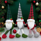 Christmas gnome with long legs, sitting decorative figure
