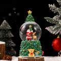 Christmas snow globe with music and light
