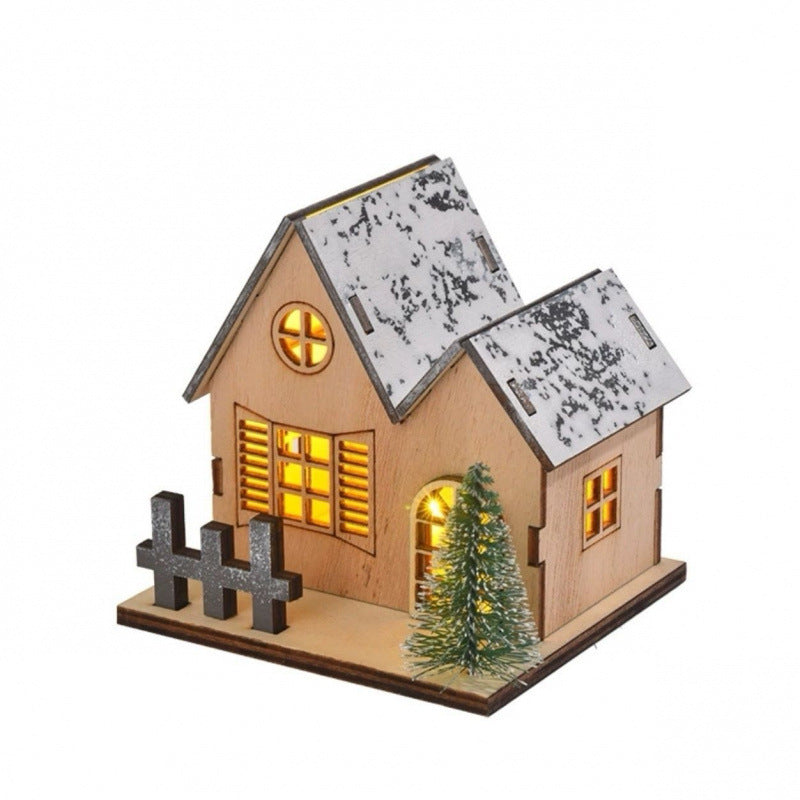 Illuminated wooden house for Christmas decoration