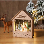 Illuminated wooden house with Christmas motif