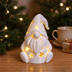 Christmas gnome made of resin with star pattern for LED tea lights