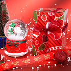 Illuminated snow globe music box with music