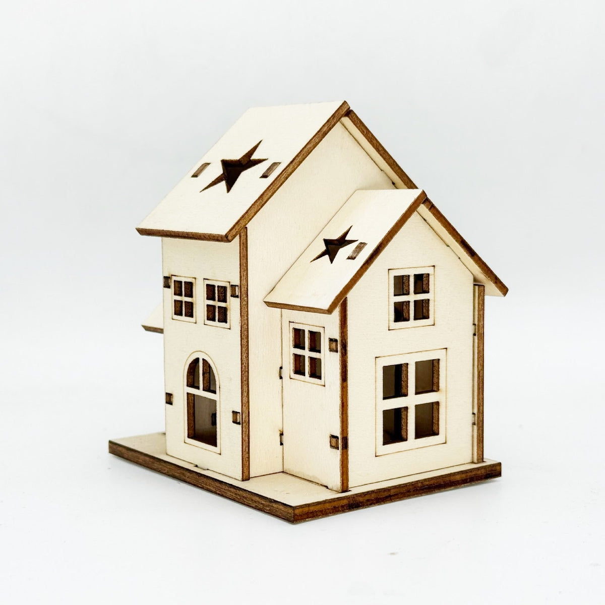 Illuminated wooden house for Christmas decoration