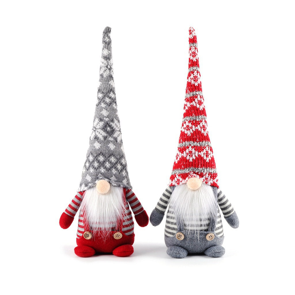 Christmas elf figure with knitted hat, sitting