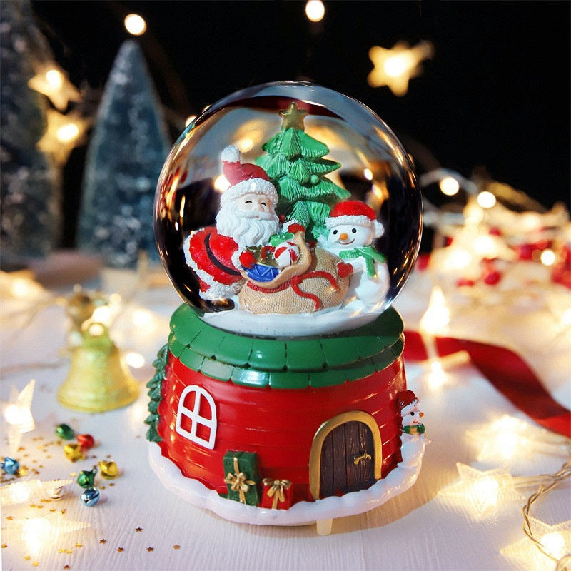 Christmas music box with snow globe and light