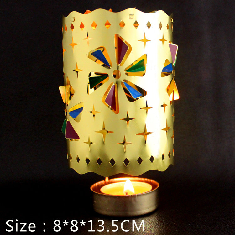 Rotating tealight holder made of brass, classic design