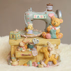 Music box in sewing machine design with bear motif