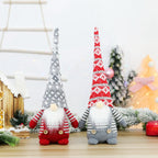 Christmas elf figure with knitted hat, sitting