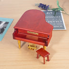 Wooden music box in piano shape with metal feet