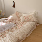 Cozy bedding set with ruffles and vintage rose pattern