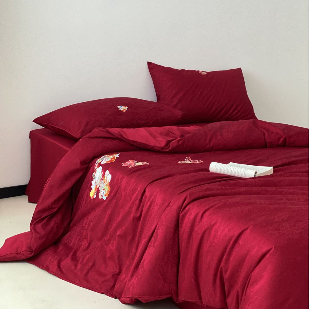 Premium bedding set made of Mako cotton satin with floral jacquard structure and embroidered applications Bowlift