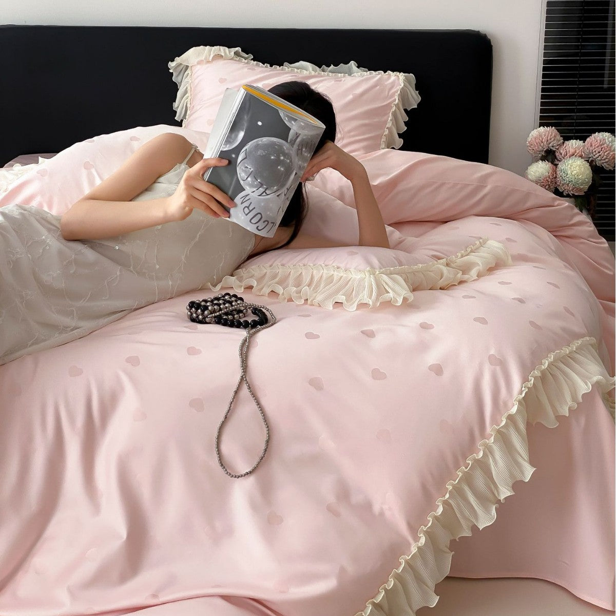 Luxurious satin bedding set with ruffles and subtle heart print Bowlift