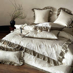 Ruffled bedding set made of cotton satin with rose embroidery and contrast piping