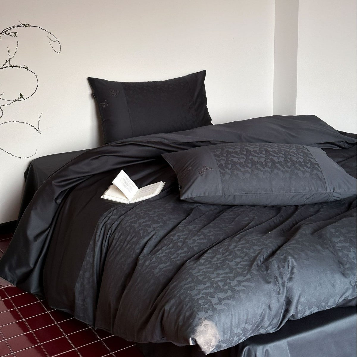 Luxurious satin bedding with floral jacquard and contrast piping