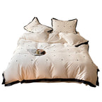 Bedding set made of cotton satin with mini heart embroidery and contrast piping Bowlift