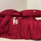 Premium bedding set made of Mako cotton satin with floral jacquard structure and embroidered applications Bowlift