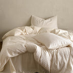 Bedding set made of cotton percale with fine check pattern and quilted comforter