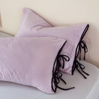 Pillowcase set in washed linen look with decorative ties