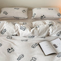 Cozy microfleece bedding set with cute dog motifs and piped edges