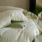 Fine woven bedding set made of cotton satin with subtle jacquard flower texture
