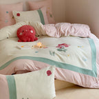 Children's bedding set with quilted blanket, waffle texture and embroidered sea motif