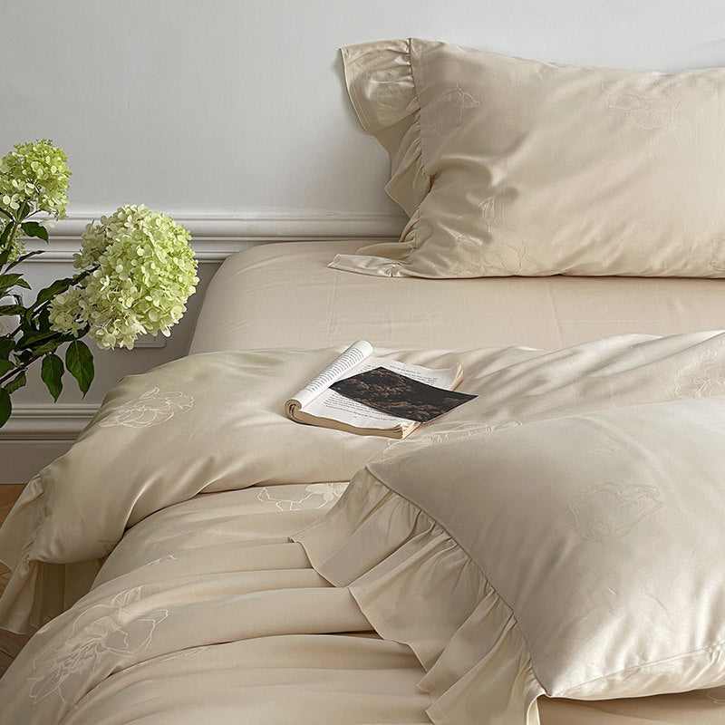 Bedding set made of cotton satin with ruffle, subtle jacquard floral relief and silky-matt finish